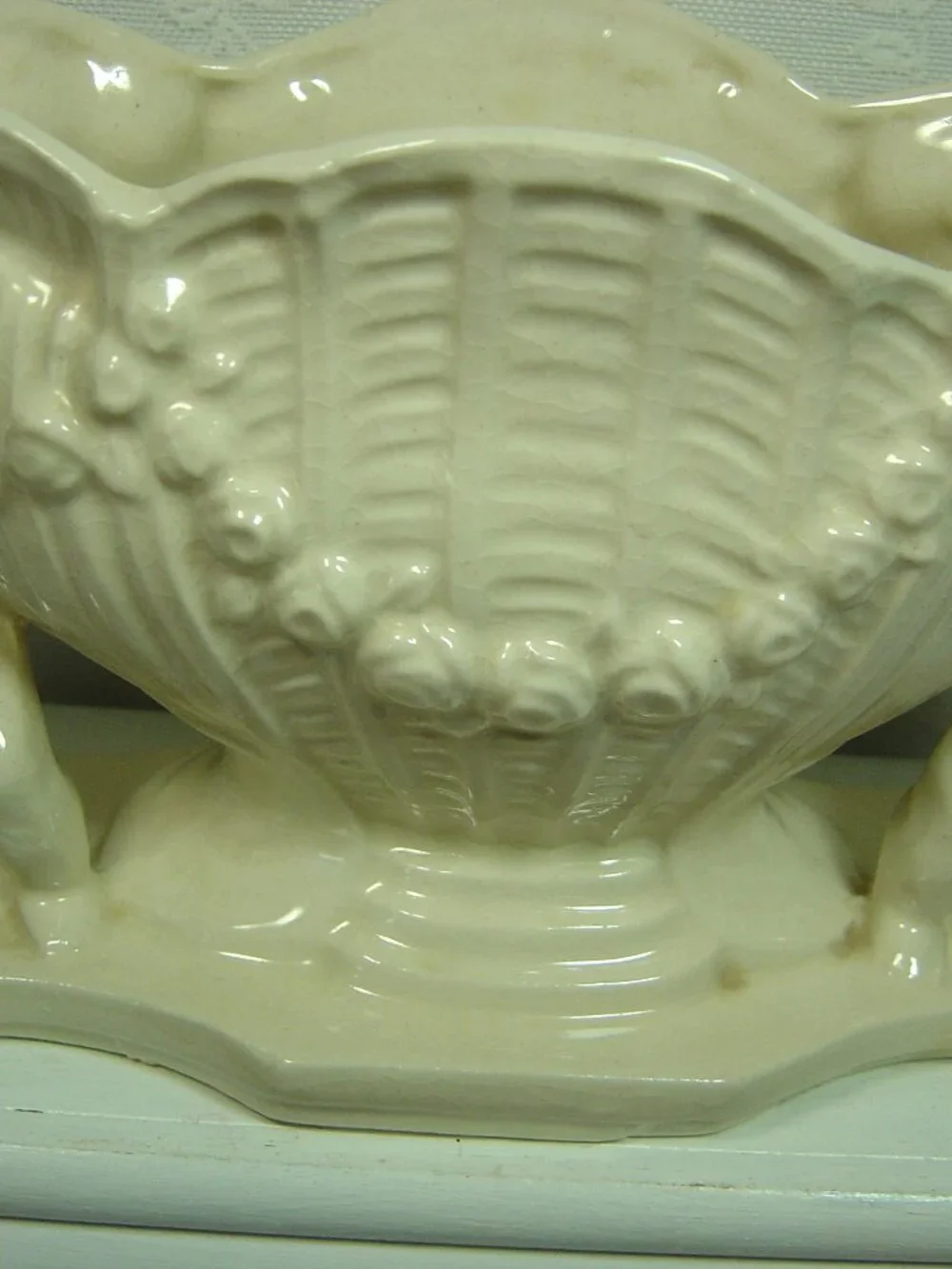 Vintage white planter/vase--cherubs beside a vase-5 1/4